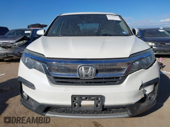 2019 Honda Pilot EX-L with VIN 5FNYF5H59KB017415, listed as a IAAI auction lot 41340852 with 125,433 mi miles and . Bid and sale history available at DreamBid. Image 13.