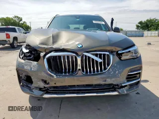 2023 BMW X5 xDrive40i with VIN 5UXCR6C01P9P27041, listed as a Copart auction lot 59009585 with 45,568 mi miles and Salvage title. Bid and sale history available at DreamBid. Image 5.