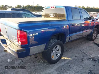 2010 Dodge Dakota Bighorn/Lonestar with VIN 1D7CW3GP5AS130870, listed as a IAAI auction lot 40929651 with 128,077 mi miles. Bid and sale history available at carsss.com. Image 4.