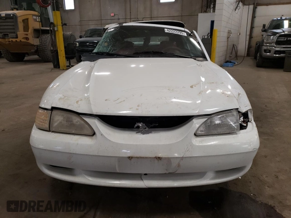 1994 Ford Mustang z VIN 1FALP45T4RF149529, wystawiony jako Copart lot #42222295 z przebiegiem 179 309 mil mil oraz Szkoda całkowita • Salvage title. Historia ofert i sprzedaży dostępna na DreamBid. Obrazek 5.