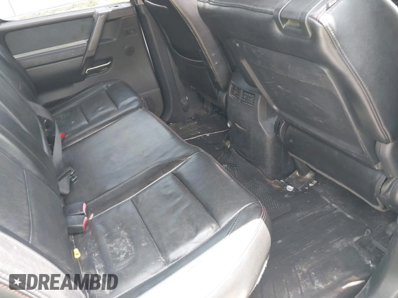 2012 Nissan Titan SL with VIN 1N6BA0EC1CN326919, listed as a IAAI auction lot 42630368 with 230,215 mi miles and . Bid and sale history available at DreamBid. Image 8.