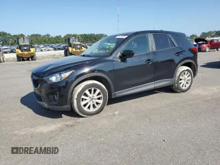 2014 Mazda CX-5 Sport with VIN JM3KE2BE8E0310636, listed as a Copart auction lot 66152055 with 127,585 mi miles and Clean title. Bid and sale history available at DreamBid. Image 1.