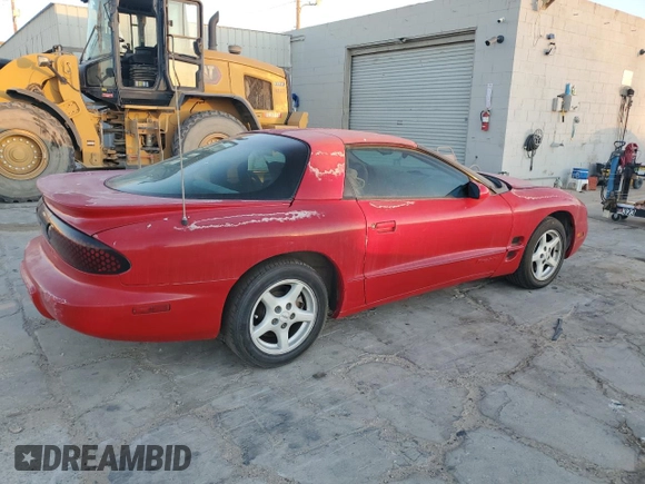 1998 Pontiac Firebird Firebird z VIN 2G2FS22K0W2201603, wystawiony jako Copart lot #79671704 z przebiegiem 309 203 mil mil oraz Czysty tytuł • Clean title. Historia ofert i sprzedaży dostępna na DreamBid. Obrazek 3.