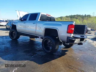 2015 GMC Sierra 2500HD available WiFi Denali with VIN 1GT120E87FF173940, listed as a IAAI auction lot 41843586 with 167,992 mi miles. Bid and sale history available at carsss.com. Image 3.