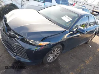 2020 Toyota Camry LE with VIN 4T1C11AK0LU864863, listed as a IAAI auction lot 41748371 with 82,063 mi miles and . Bid and sale history available at carsss.com. Image 17.