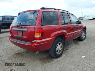 2004 Jeep Grand Cherokee Laredo z VIN 1J4GW48S04C389585, wystawiony jako IAAI lot #42461413 z przebiegiem 228 672 mil mil oraz . Historia ofert i sprzedaży dostępna na DreamBid. Obrazek 4.
