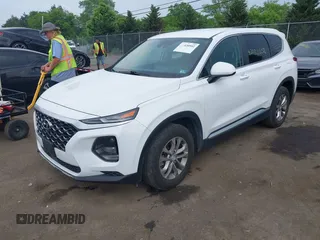 2019 Hyundai Santa Fe SE with VIN 5NMS23AD7KH111542, listed as a IAAI auction lot 42430502 with 78,755 mi miles and . Bid and sale history available at DreamBid. Image 2.