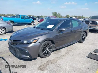 2023 Toyota Camry SE with VIN 4T1G11AK1PU809099, listed as a IAAI auction lot 41450292 with 128,099 mi miles. Bid and sale history available at carsss.com. Image 17.