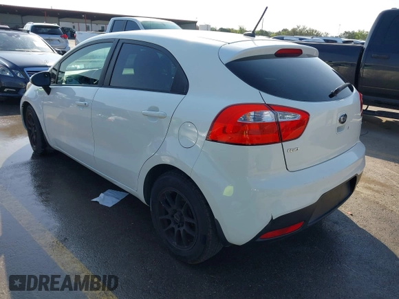 2015 Kia Rio LX with VIN KNADM5A39F6500074, listed as a IAAI auction lot 41871224 with 126,209 mi miles. Bid and sale history available at carsss.com. Image 3.