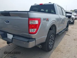 2022 Ford F-150 XL with VIN 1FTFW1E52NFA73233, listed as a IAAI auction lot 42311048 with 14,298 mi miles and . Bid and sale history available at DreamBid. Image 4.