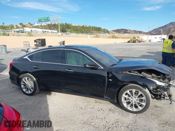2022 Cadillac CT5 Premium Luxury z VIN 1G6DN5RK8N0118974, wystawiony jako IAAI lot #41265623 z przebiegiem 40 568 mil mil oraz . Historia ofert i sprzedaży dostępna na DreamBid. Obrazek 13.