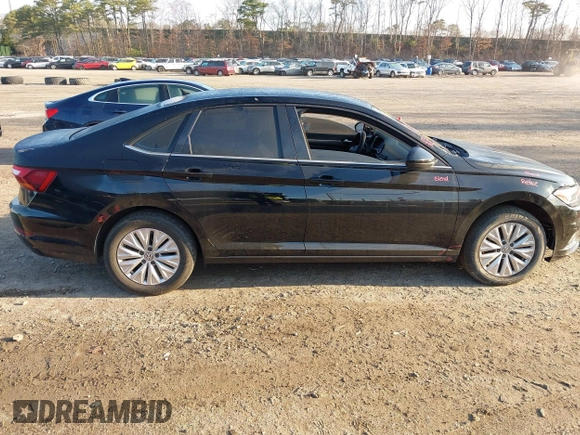 2019 Volkswagen Jetta S z VIN 3VWCB7BU6KM144584, wystawiony jako IAAI lot #41963870 z przebiegiem 205 028 mil mil oraz . Historia ofert i sprzedaży dostępna na DreamBid. Obrazek 13.