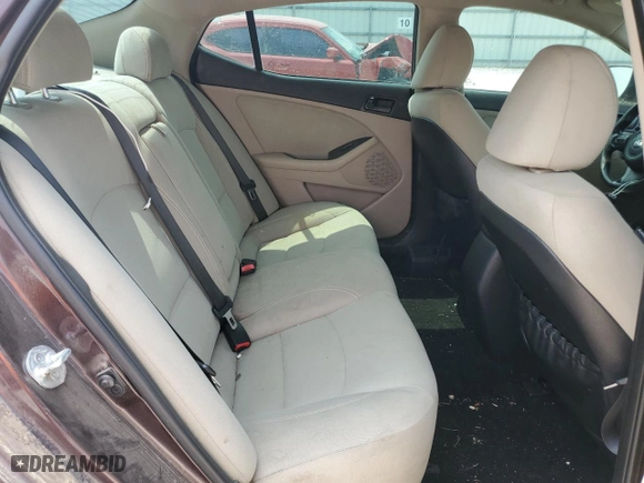 2015 Kia Optima LX with VIN 5XXGM4A73FG358013, listed as a Copart auction lot 82112314 with 135,264 mi miles and Salvage Title. Bid and sale history available at carsss.com. Image 10.
