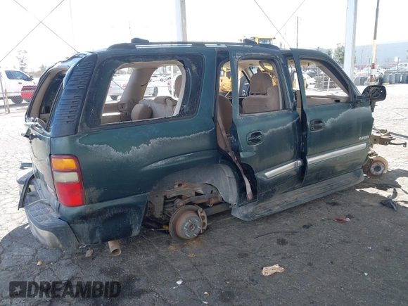 2003 GMC Yukon SLT z VIN 1GKEC13V43J304588, wystawiony jako IAAI lot #41525446 z przebiegiem Nie podano mil oraz . Historia ofert i sprzedaży dostępna na DreamBid. Obrazek 4.
