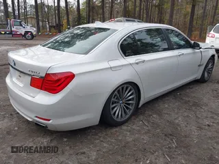 2011 BMW 7 Series 740Li with VIN WBAKB4C55BC574481, listed as a IAAI auction lot 41070506 with 105,021 mi miles and . Bid and sale history available at carsss.com. Image 4.