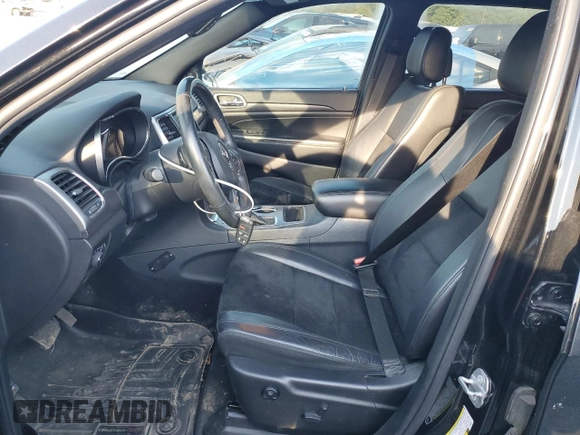 2018 Jeep Grand Cherokee Laredo E with VIN 1C4RJFAG9JC390597, listed as a Copart auction lot 71450474 with 69,645 mi miles and Salvage title. Bid and sale history available at DreamBid. Image 7.