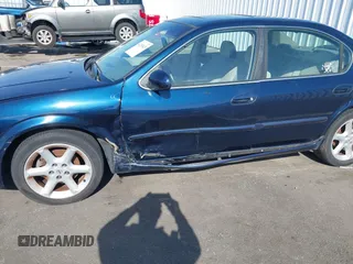 2003 Nissan Maxima SE z VIN JN1DA31D03T516575, wystawiony jako IAAI lot #42153623 z przebiegiem 176 446 mil mil oraz . Historia ofert i sprzedaży dostępna na DreamBid. Obrazek 6.