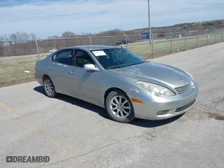 2002 Lexus ES 300 with VIN JTHBF30G725010406, listed as a IAAI auction lot 41821936 with 194,187 mi miles. Bid and sale history available at carsss.com. Image 1.