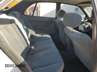 1992 Toyota Camry LE z VIN 4T1SK12E8NU044387, wystawiony jako Copart lot #43195915 z przebiegiem 279 199 mil mil oraz Szkoda całkowita • Salvage title. Historia ofert i sprzedaży dostępna na DreamBid. Obrazek 11.