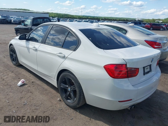 2014 BMW 3 Series 328i with VIN WBA3A5C5XEJ463938, listed as a IAAI auction lot 42103330 with 194,263 mi miles and . Bid and sale history available at DreamBid. Image 3.