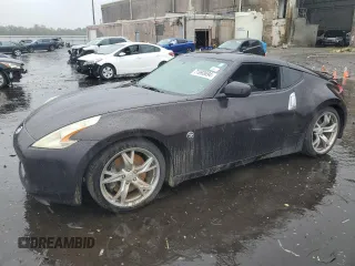2012 Nissan 370Z z VIN JN1AZ4EH8CM560512, wystawiony jako Copart lot #71993694 z przebiegiem Nie podano mil oraz Szkody całkowita. Historia ofert i sprzedaży dostępna na DreamBid. Obrazek 1.