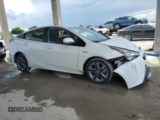 2020 Toyota Prius L Eco with VIN JTDKARFU0L3125927, listed as a Copart auction lot 63796095 with 21,895 mi miles and Salvage title. Bid and sale history available at DreamBid. Image 4.
