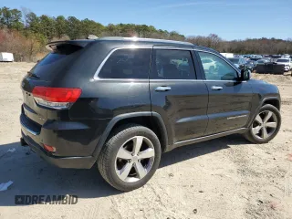 2014 Jeep Grand Cherokee Limited z VIN 1C4RJFBG3EC156735, wystawiony jako Copart lot #49113995 z przebiegiem 121 547 mil mil oraz Szkoda całkowita • Salvage title. Historia ofert i sprzedaży dostępna na DreamBid. Obrazek 3.