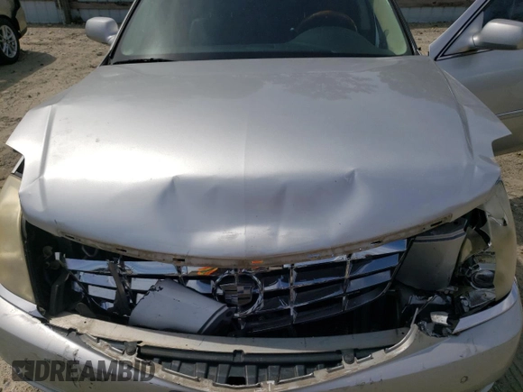 2009 Cadillac DTS 1SA z VIN 1G6KD57Y69U114700, wystawiony jako Copart lot #56007485 z przebiegiem 158 849 mil mil oraz Szkoda całkowita • Salvage title. Historia ofert i sprzedaży dostępna na DreamBid. Obrazek 11.