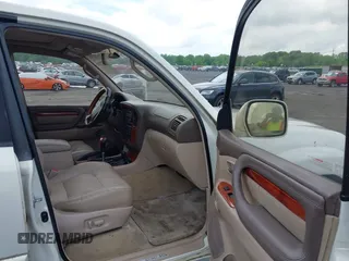 2001 Lexus LX 470 z VIN JTJHT00W613506010, wystawiony jako IAAI lot #42277268 z przebiegiem 186 671 mil mil oraz . Historia ofert i sprzedaży dostępna na DreamBid. Obrazek 5.