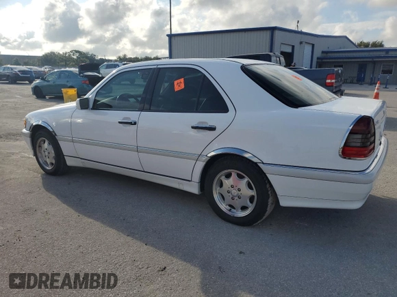 1999 Mercedes-Benz C 230/260/280/320 with VIN WDBHA24G5XA780454, listed as a Copart auction lot 73794674 with 90,578 mi miles and Salvage Title. Bid and sale history available at carsss.com. Image 2.