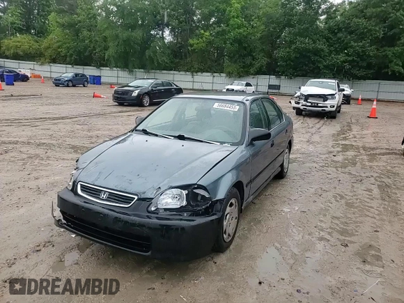 1997 Honda Civic LX z VIN 2HGEJ6676VH507855, wystawiony jako Copart lot #56684455 z przebiegiem 185 498 mil mil oraz Szkoda całkowita • Salvage title. Historia ofert i sprzedaży dostępna na DreamBid. Obrazek 13.