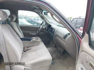 2002 Toyota Tundra SR5 with VIN 5TBRN34112S231284, listed as a IAAI auction lot 41886121 with 364,985 mi miles and . Bid and sale history available at DreamBid. Image 5.