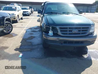 2001 Ford F-150 XL with VIN 1FTPF17L51NB38169, listed as a IAAI auction lot 41999741 with 118,360 mi miles and . Bid and sale history available at DreamBid. Image 6.