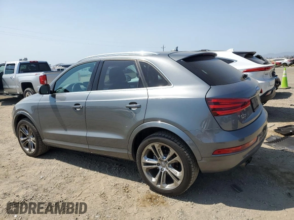2015 Audi Q3 Prestige with VIN WA1GFCFS8FR009731, listed as a Copart auction lot 59897225 with 84,138 mi miles and Salvage title. Bid and sale history available at DreamBid. Image 2.