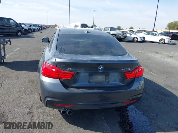 2018 BMW 4 Series 430i xDrive with VIN WBA4J3C56JBG91418, listed as a IAAI auction lot 41476609 with 78,965 mi miles and . Bid and sale history available at DreamBid. Image 17.
