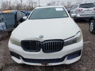 2016 BMW 7 Series 740i with VIN WBA7E2C50GG714647, listed as a IAAI auction lot 41745442 with 134,399 mi miles and . Bid and sale history available at carsss.com. Image 13.