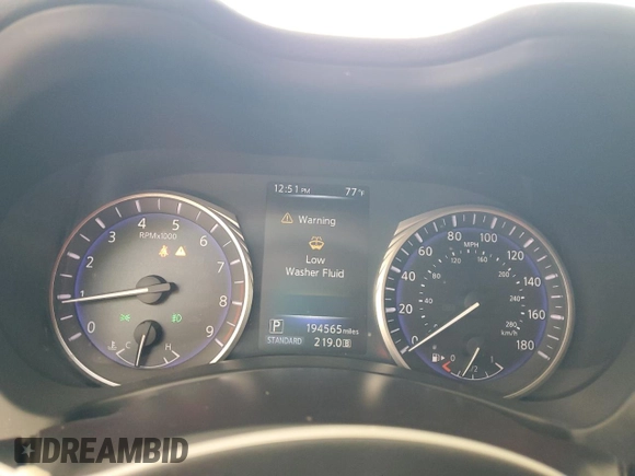 2014 Infiniti Q50 Premium with VIN JN1BV7APXEM688882, listed as a Copart auction lot 60543615 with 194,565 mi miles and Non repairable. Bid and sale history available at DreamBid. Image 9.