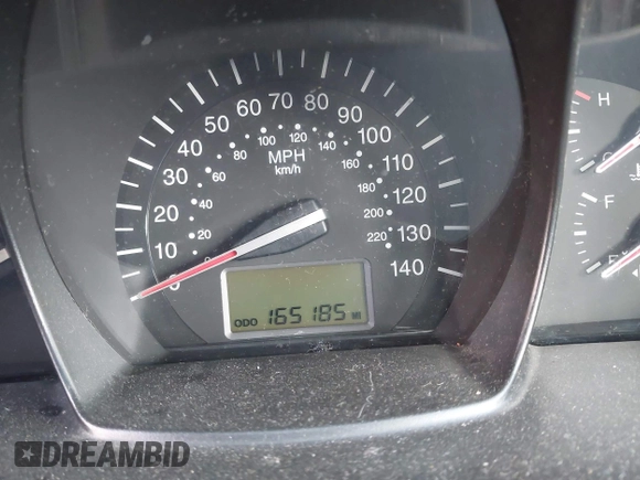 2009 Kia Spectra EX with VIN KNAFE221095634712, listed as a IAAI auction lot 41930897 with 165,185 mi miles. Bid and sale history available at carsss.com. Image 7.