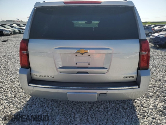 2017 Chevrolet Suburban Premier z VIN 1GNSKJKC4HR316953, wystawiony jako Copart lot #76944884 z przebiegiem 105 753 mil mil oraz Szkoda całkowita • Salvage title. Historia ofert i sprzedaży dostępna na DreamBid. Obrazek 6.