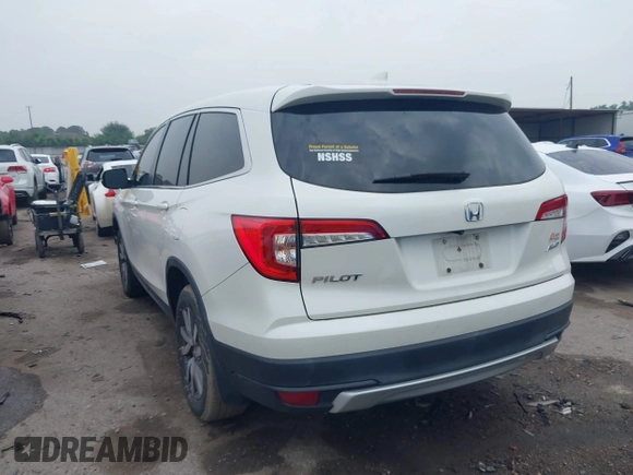 2019 Honda Pilot EX-L with VIN 5FNYF6H52KB025930, listed as a IAAI auction lot 42117673 with 84,721 mi miles and . Bid and sale history available at DreamBid. Image 3.