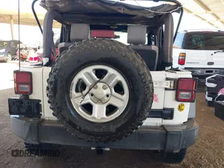 2007 Jeep Wrangler X with VIN 1J4FA24137L128418, listed as a IAAI auction lot 42317921 with 148,412 mi miles and . Bid and sale history available at DreamBid. Image 15.