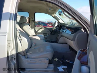 2009 Chevrolet Suburban LT w/2LT with VIN 1GNFC26099R177554, listed as a IAAI auction lot 38664519 with 311,063 mi miles. Bid and sale history available at carsss.com. Image 5.