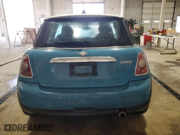 2009 MINI Hardtop with VIN WMWMF33569TW74610, listed as a Copart auction lot 54889805 with 147,533 mi miles and Salvage Title. Bid and sale history available at DreamBid. Image 6.