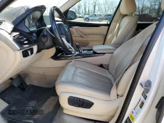 2014 BMW X5 xDrive35i with VIN 5UXKR0C58E0C27855, listed as a Copart auction lot 52254595 with 134,259 mi miles and Clean Title. Bid and sale history available at carsss.com. Image 7.