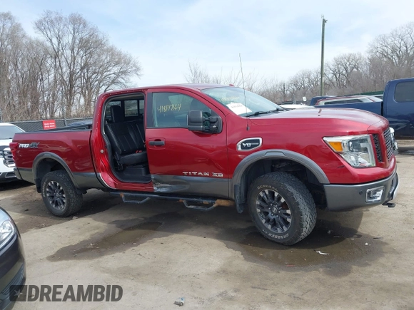2016 Nissan Titan XD S with VIN 1N6AA1F43GN510841, listed as a IAAI auction lot 41814864 with 163,025 mi miles. Bid and sale history available at carsss.com. Image 14.