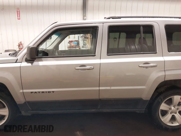 2016 Jeep Patriot Latitude with VIN 1C4NJRFB0GD581213, listed as a IAAI auction lot 42407888 with 104,202 mi miles and . Bid and sale history available at DreamBid. Image 15.
