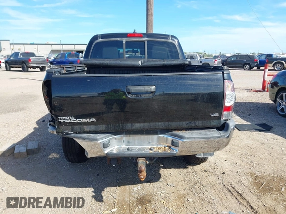 2015 Toyota Tacoma with VIN 3TMLU4EN2FM169326, listed as a IAAI auction lot 40689500 with 77,003 mi miles and . Bid and sale history available at DreamBid. Image 16.