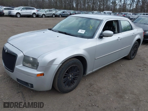 2009 Chrysler 300 Touring with VIN 2C3KA53V69H500462, listed as a IAAI auction lot 41896177 with 213,761 mi miles. Bid and sale history available at carsss.com. Image 2.