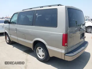 2001 GMC Safari z VIN 1GKDM19W21B502635, wystawiony jako IAAI lot #42368626 z przebiegiem 150 336 mil mil oraz . Historia ofert i sprzedaży dostępna na DreamBid. Obrazek 3.