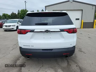 2023 Chevrolet Traverse LT z VIN 1GNEVHKW5PJ325679, wystawiony jako IAAI lot #42541394 z przebiegiem 74 480 mil mil oraz . Historia ofert i sprzedaży dostępna na DreamBid. Obrazek 5.